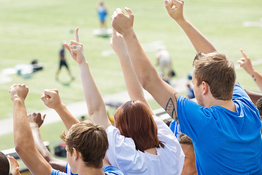 fans watching football